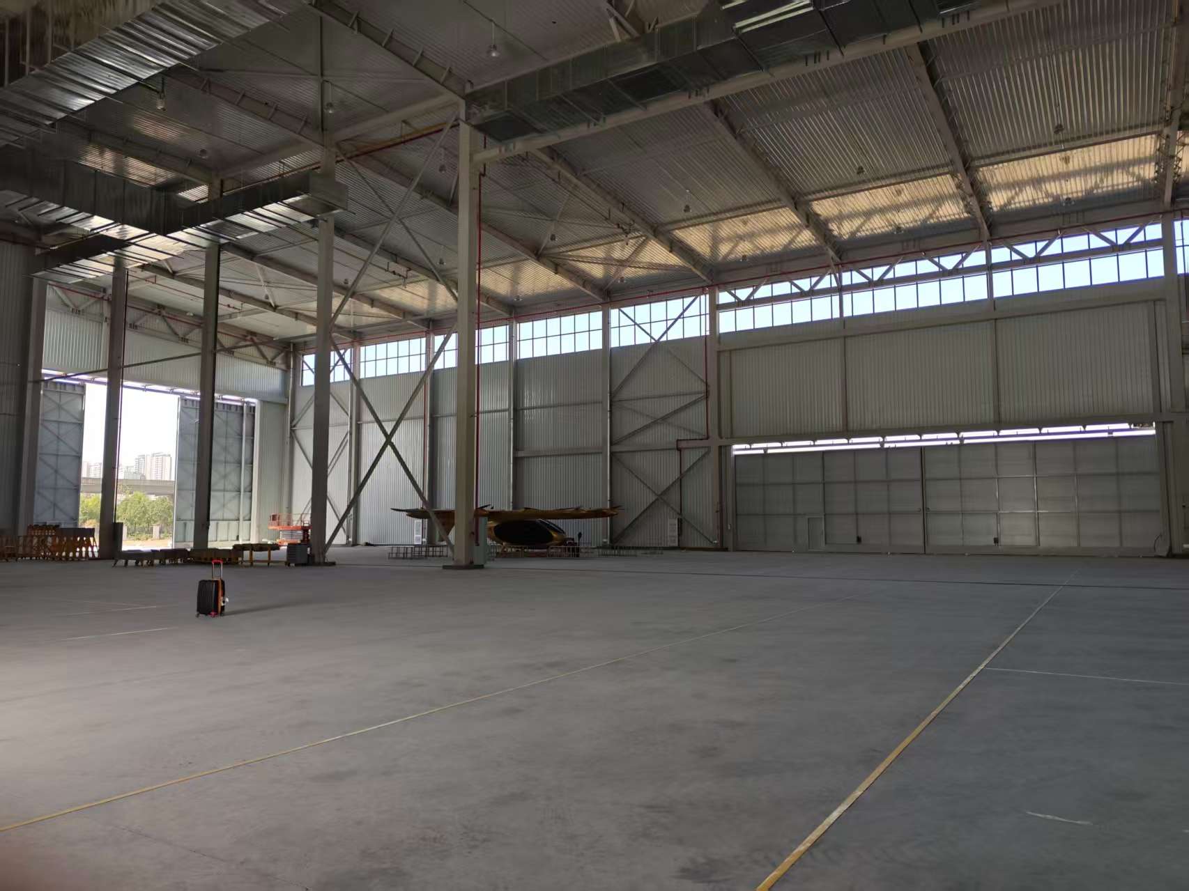 Large-scale drone hangar door