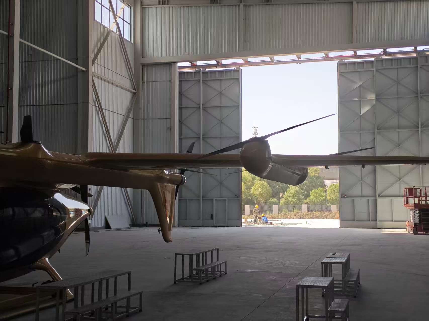 Large-scale drone hangar door