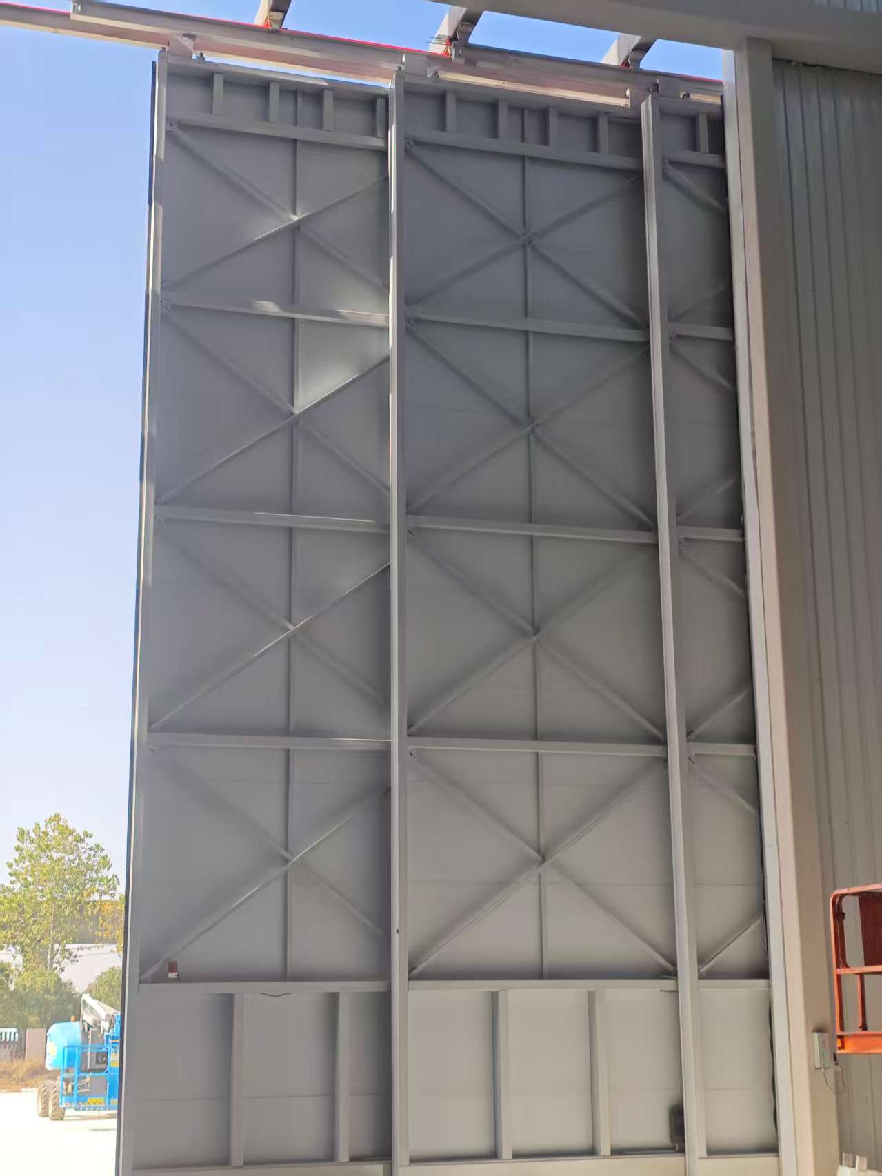 Large-scale drone hangar door