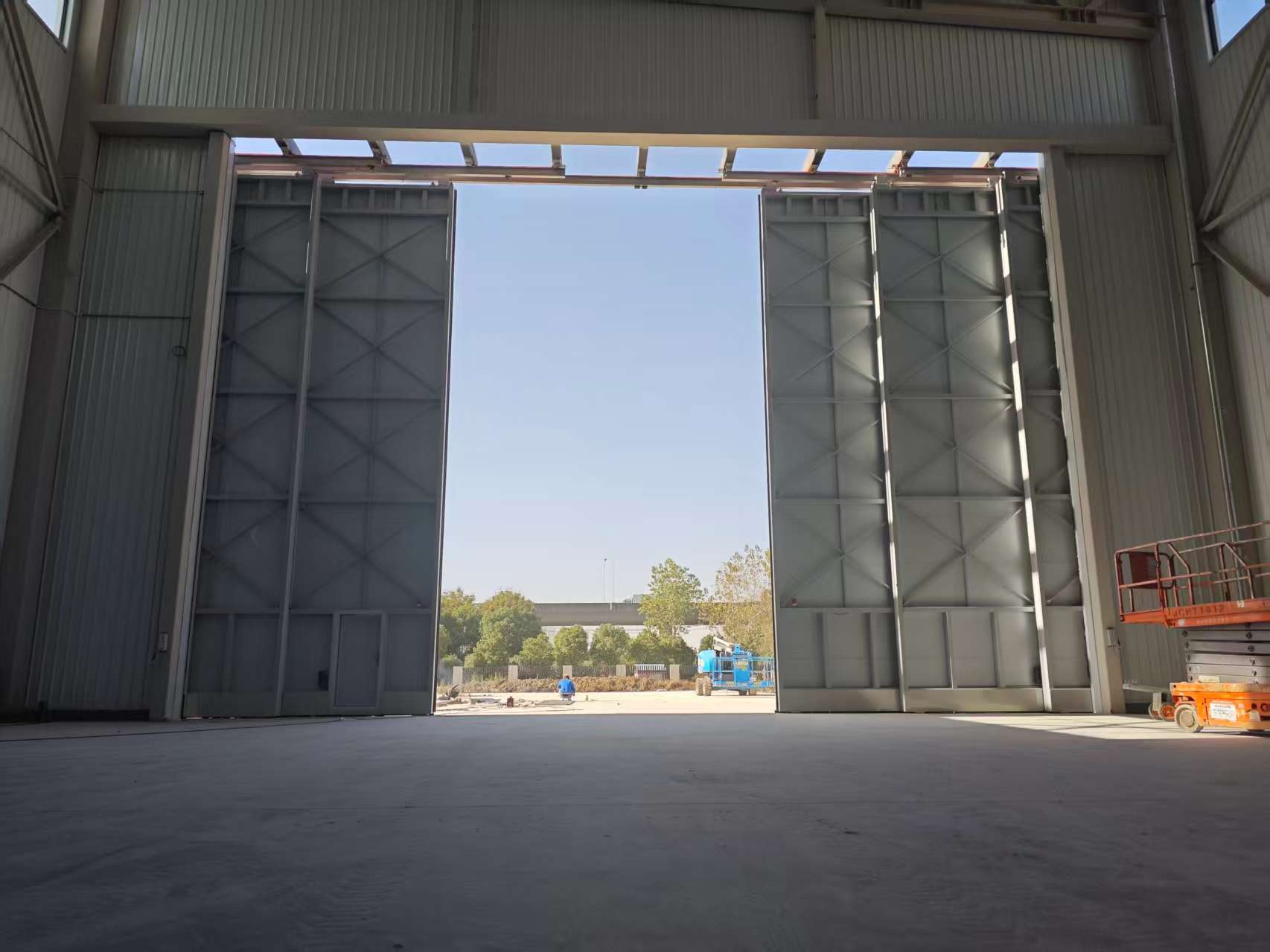 Large-scale drone hangar door