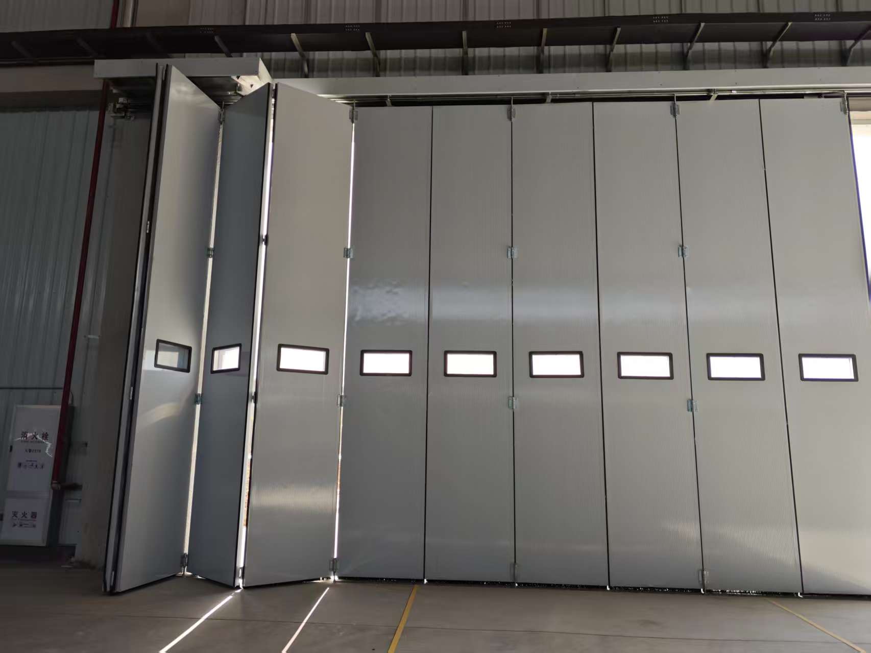 Large-scale drone hangar door