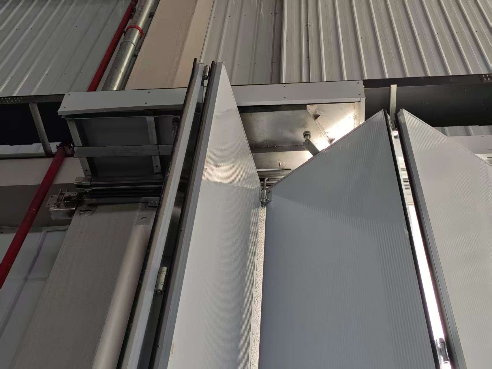 Large-scale drone hangar door