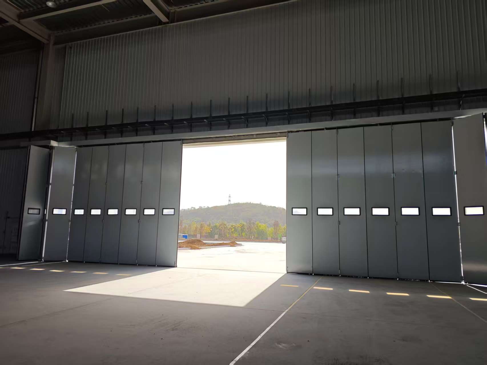 Large-scale drone hangar door
