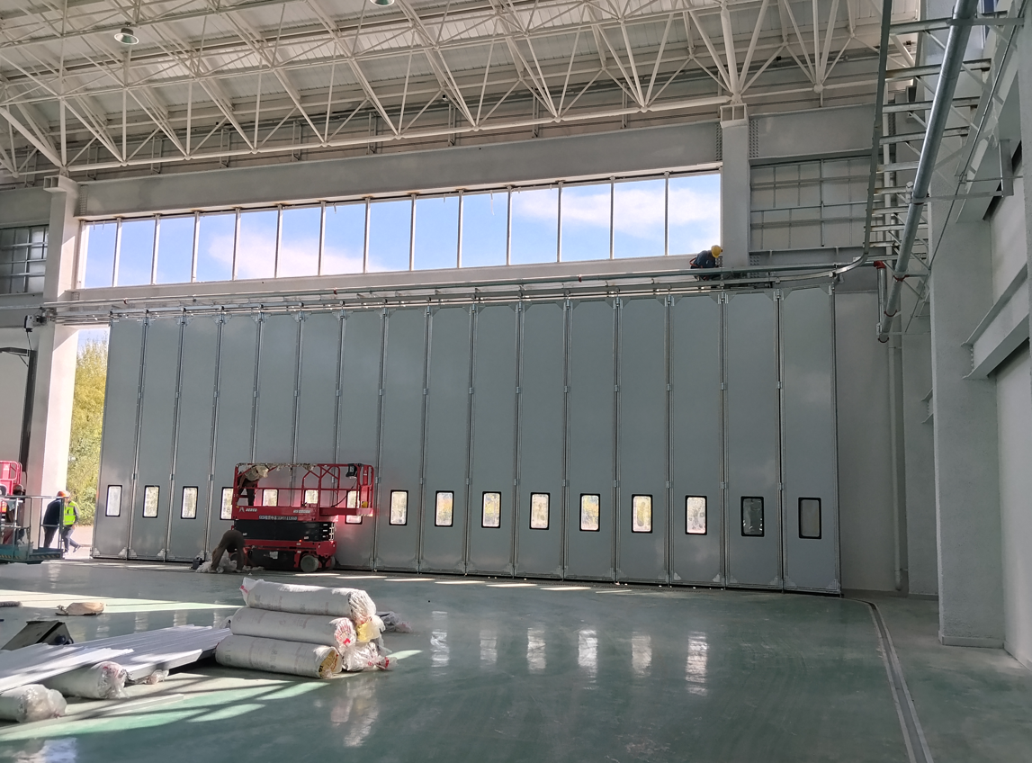 Custom Side Sliding Hangar Door: 18m × 6m Solution for Limited Headroom | Bright Building