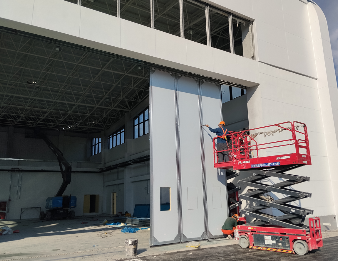 Custom Side Sliding Hangar Door: 18m × 6m Solution for Limited Headroom | Bright Building
